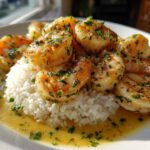 Plated Garlic Butter Shrimp and Rice Easy Recipe, featuring plump shrimp in a rich sauce over white rice.