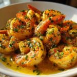 Close-up of succulent Lemon Butter Shrimp with Garlic Flavor, coated in a rich, buttery sauce and topped with fresh parsley.