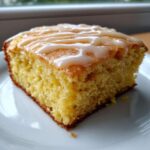 Close-up of a moist slice of Starbucks Lemon Loaf Browned Butter Blondie with lemon glaze.